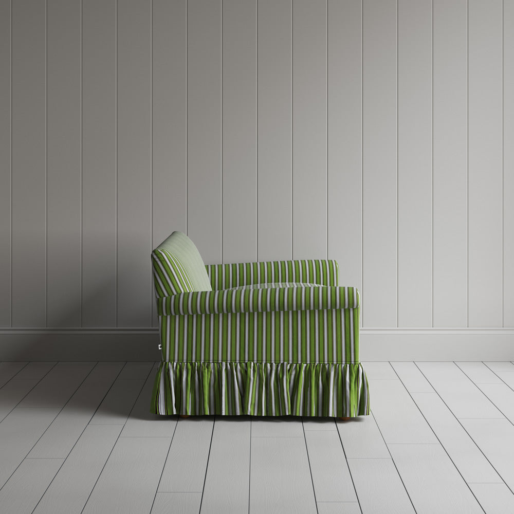 Side profile of Curtain Call love seat in Colonnade Cotton Green and Wine by Nicola Harding