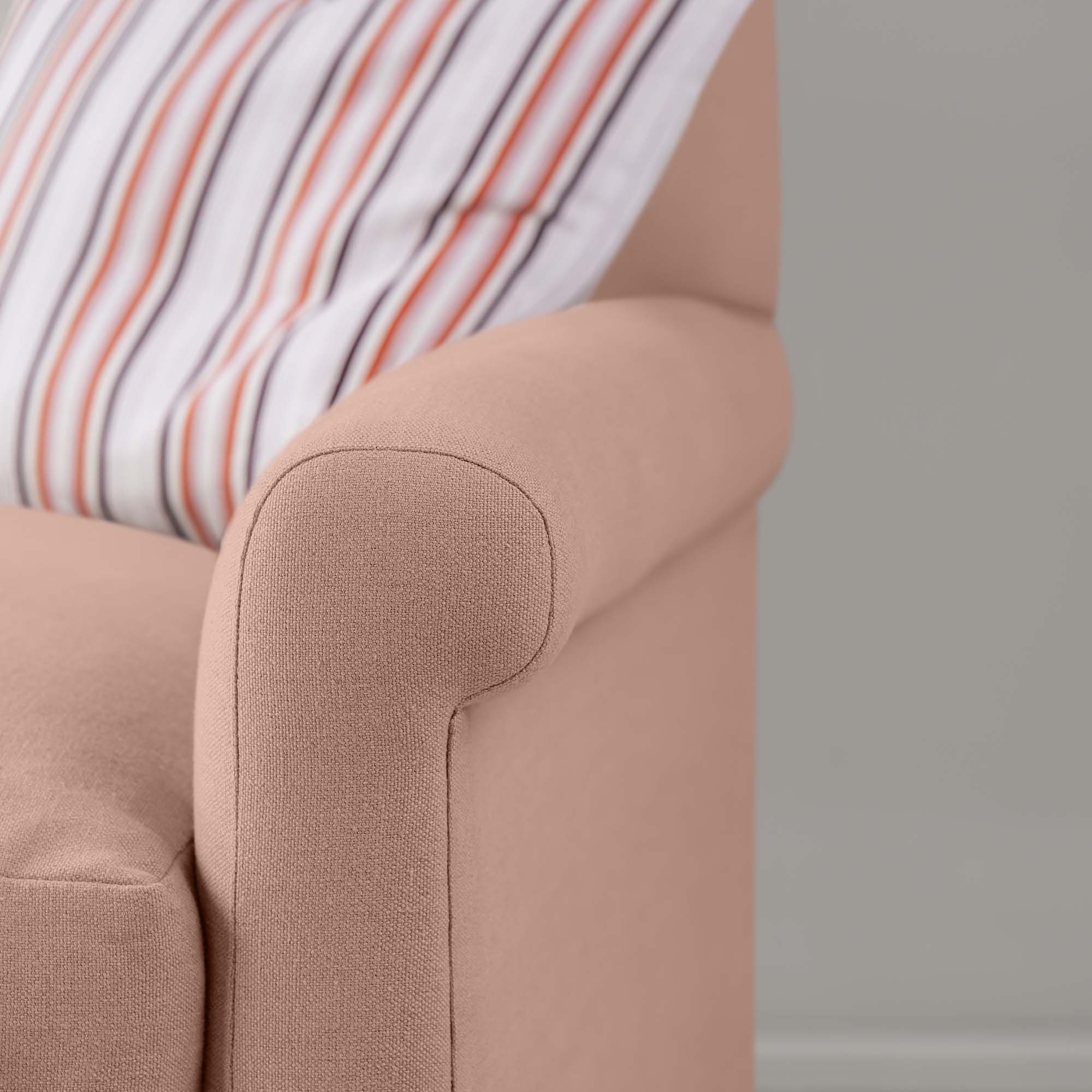 Detailed view of Roseberry linen upholstery on the armrest by Nicola Harding.