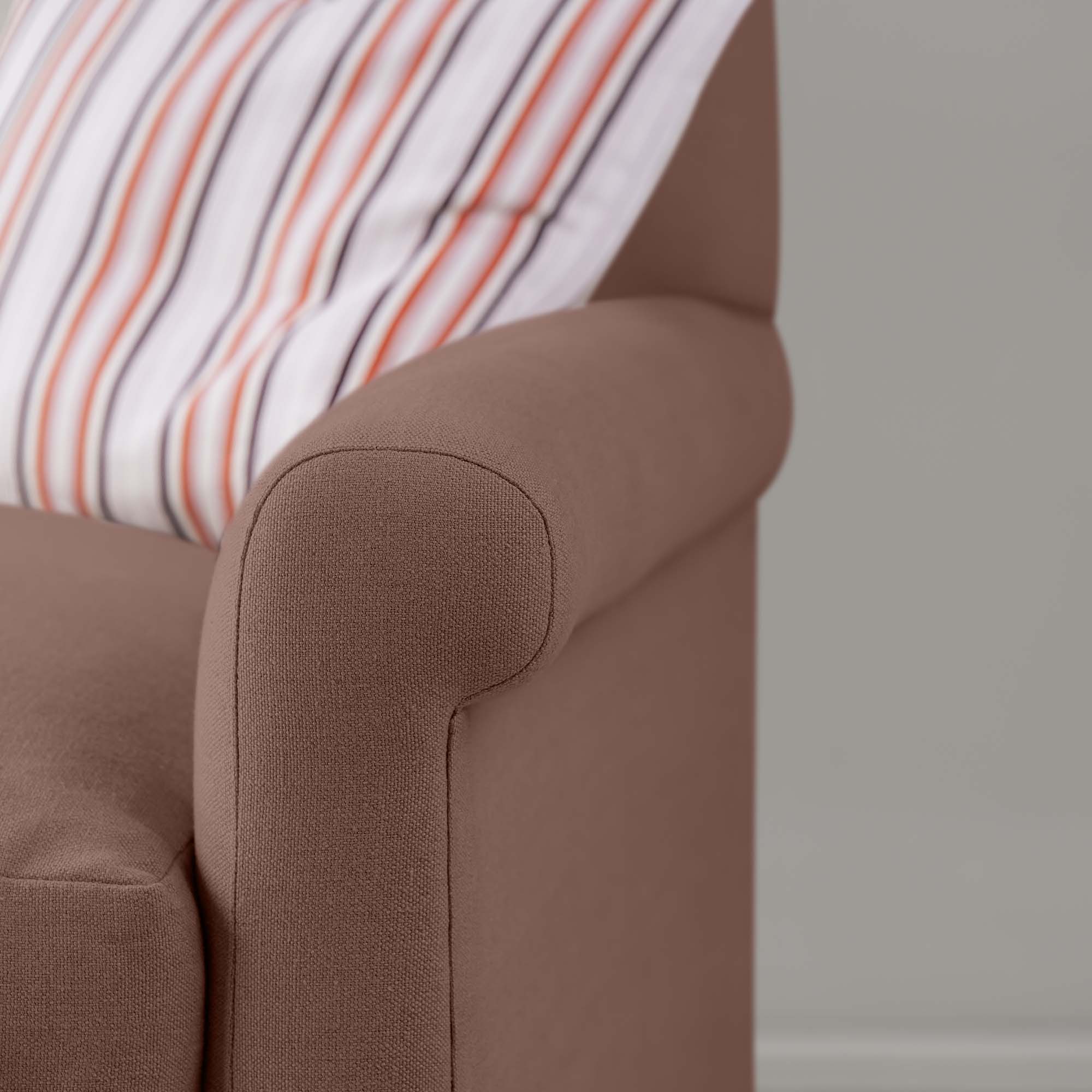 Detailed view of Sweet Briar linen upholstery on the armrest by NiX.