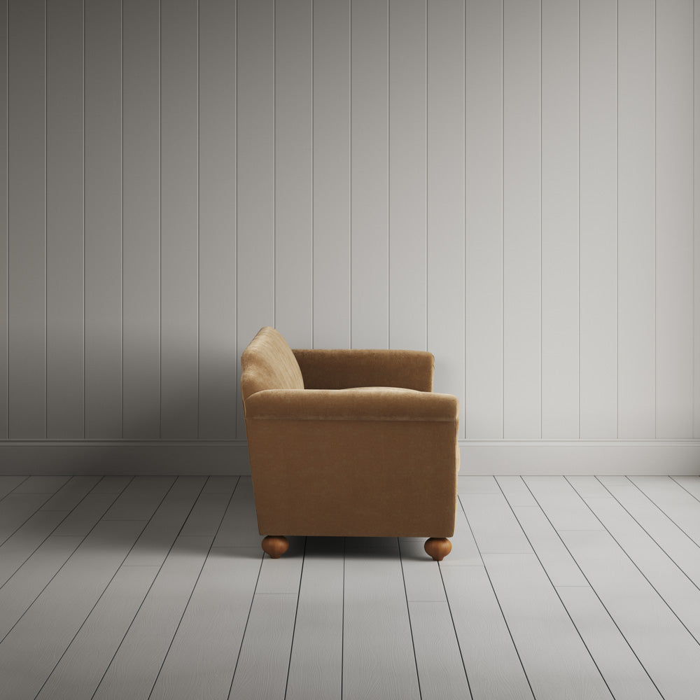 Side profile of the Stone Beige corduroy Dolittle sofa