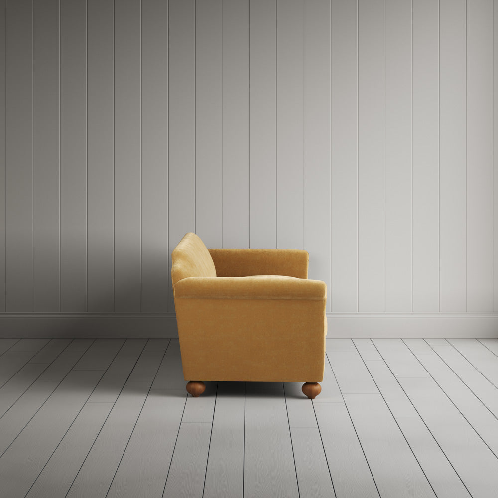 Side profile of the Wheat corduroy Dolittle sofa