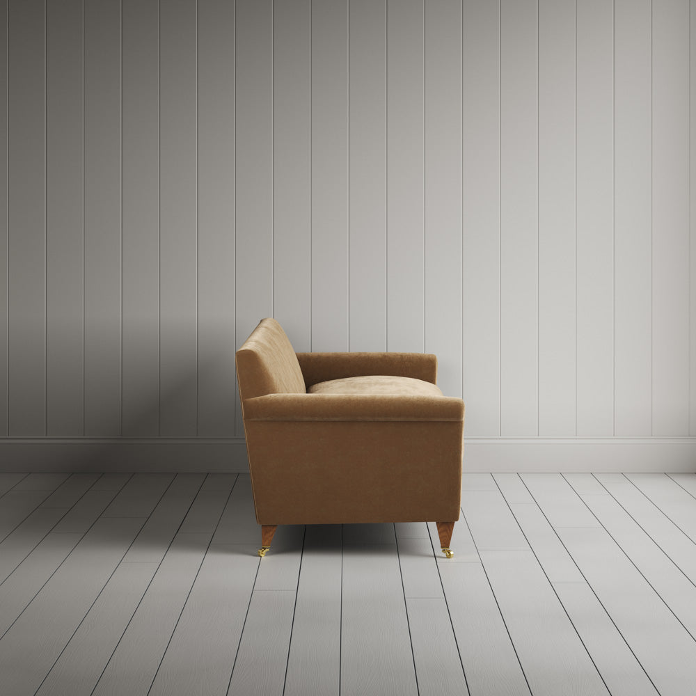 Side profile of the Stone Beige corduroy Idler sofa