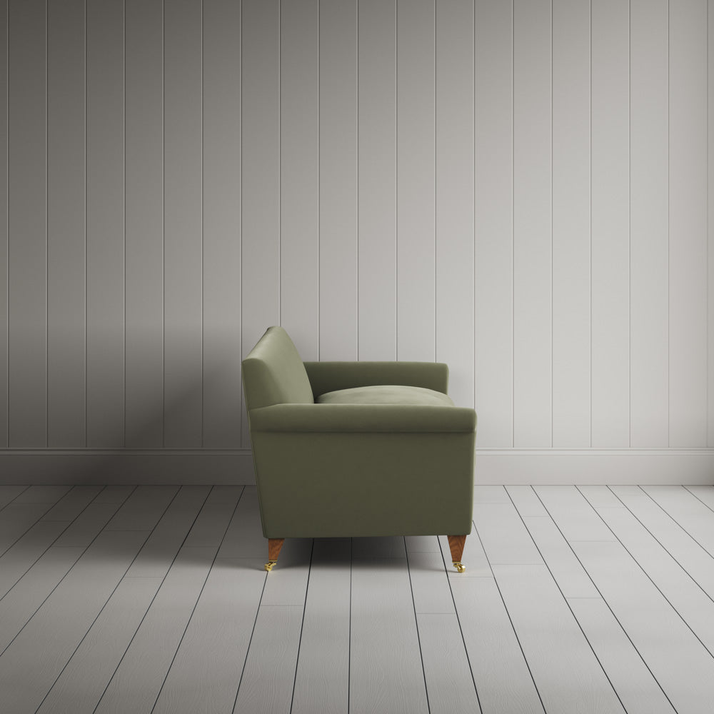 Side profile of Idler 4 seater sofa in Intelligent Velvet Green Tea