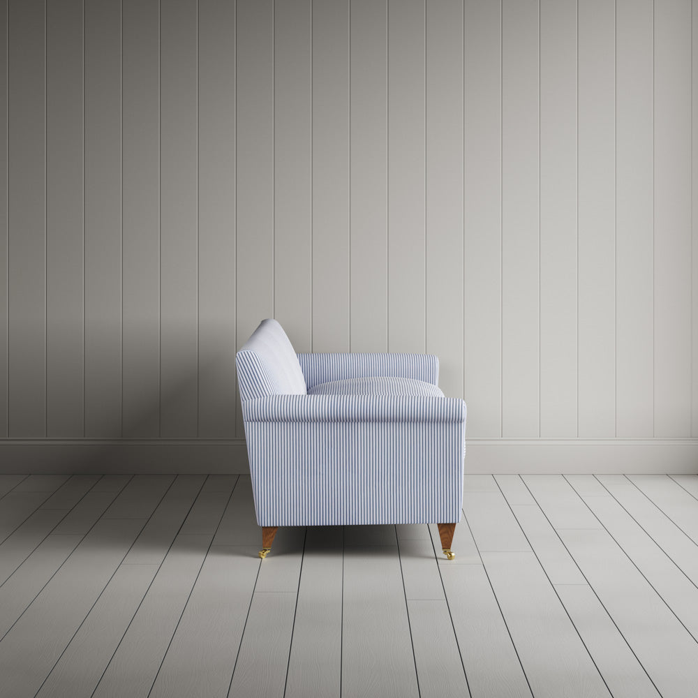 Side profile of the striped Idler sofa by Nicola Harding