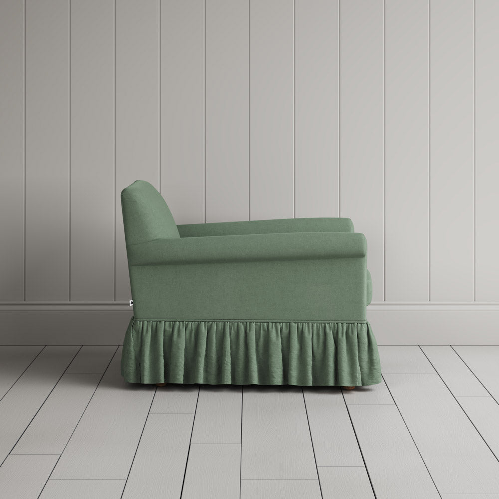 Curtain Call Armchair in Laidback Linen Moss side profile - Nicola Harding Interiors