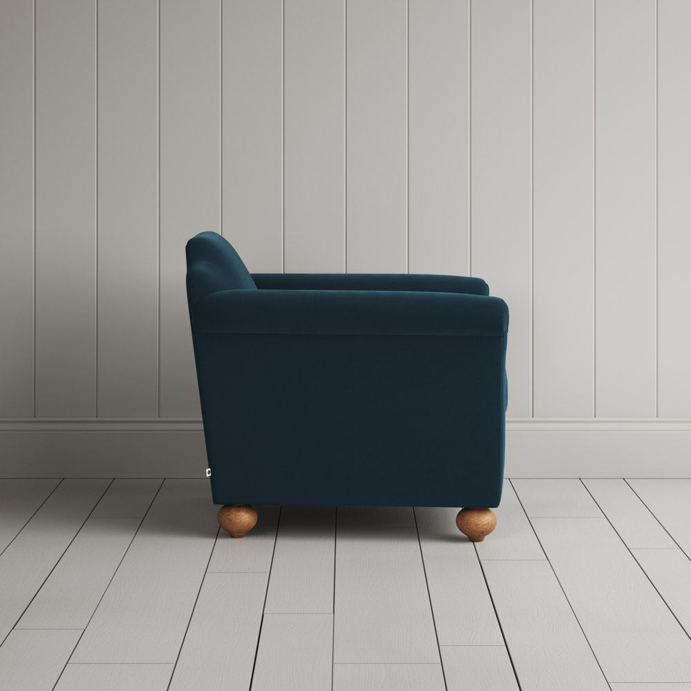 Side View of Dolittle Armchair in Intelligent Velvet Aegean
