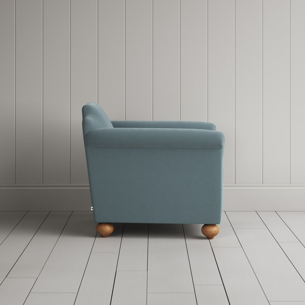 Side View of Dolittle Armchair in Intelligent Velvet Mineral