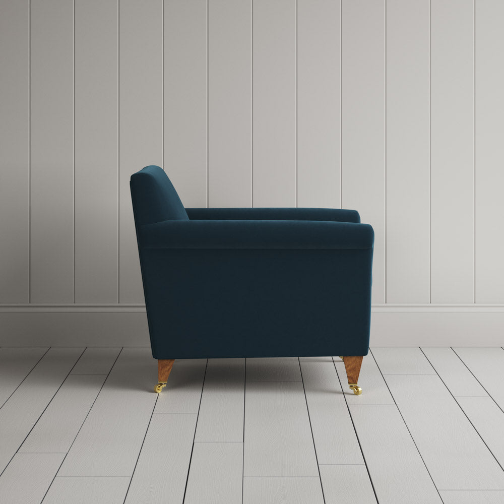 Side View of Idler Armchair in Intelligent Velvet Aegean