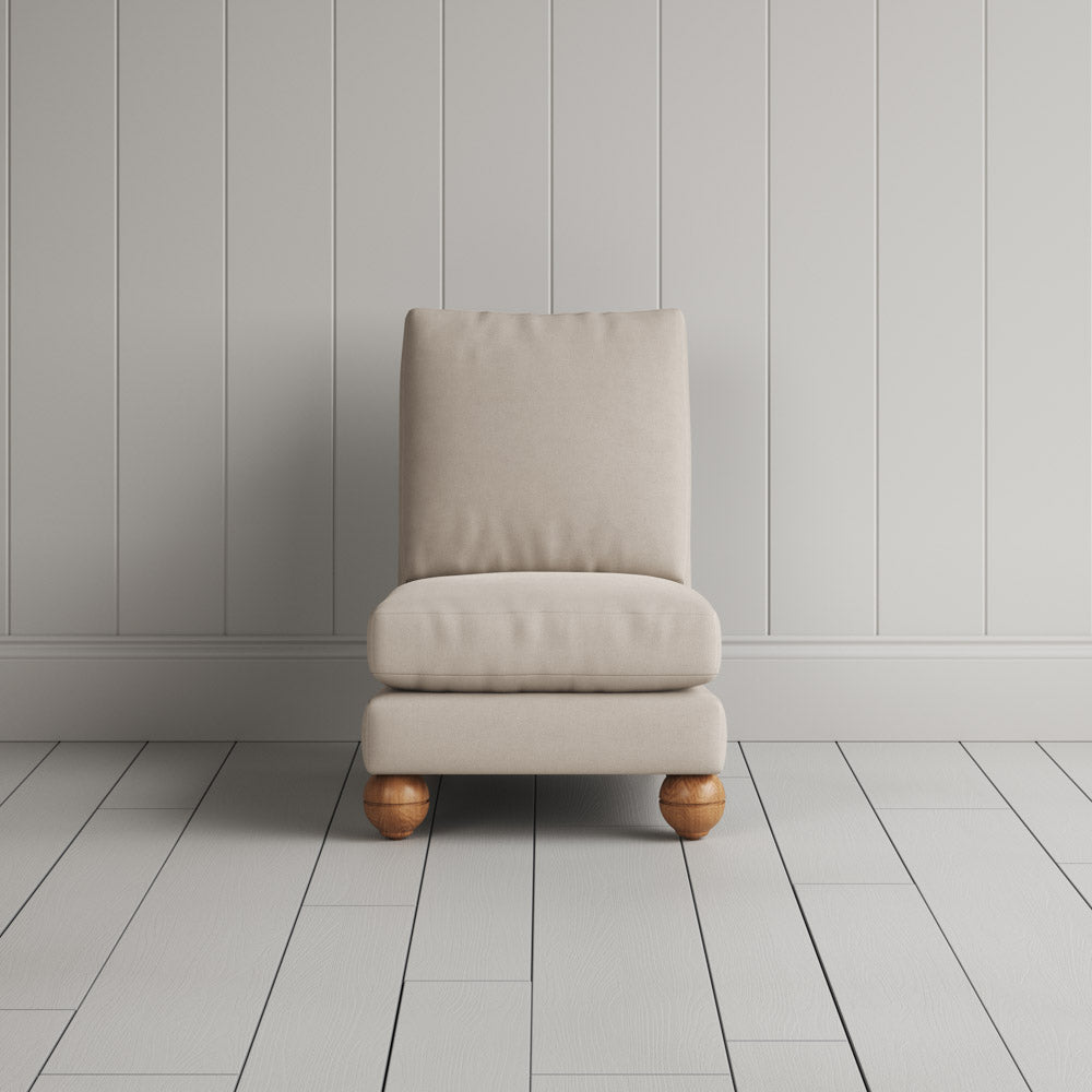 Perch Armchair in laidback linen dove, full front view by Nicola Harding.