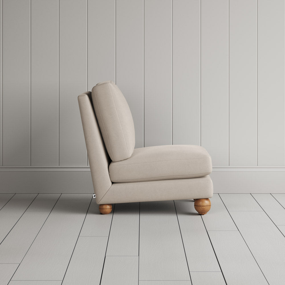 Perch Armchair laidback linen dove, side view by NiX.