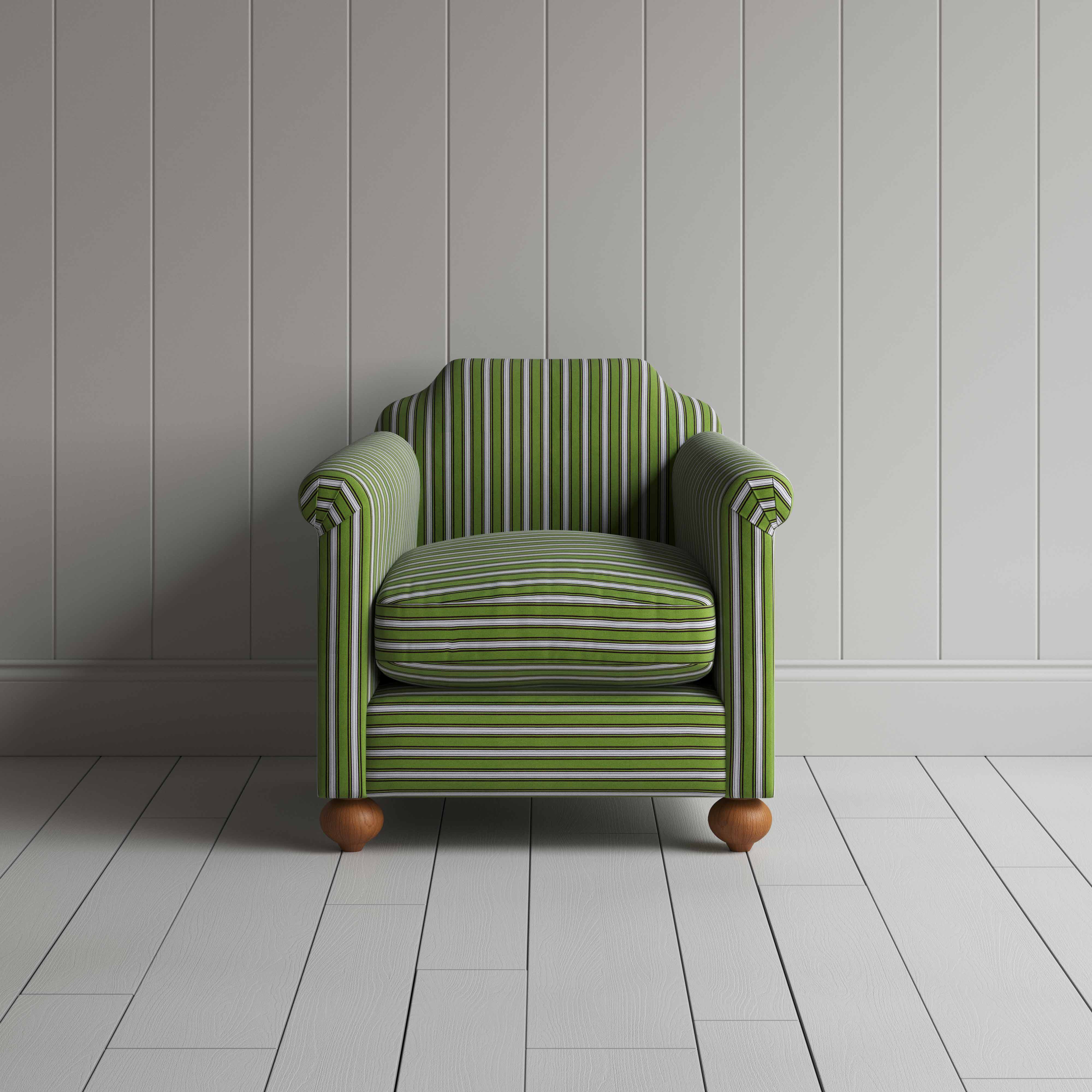 Green and white striped sofa in a spacious room with minimalistic decor.