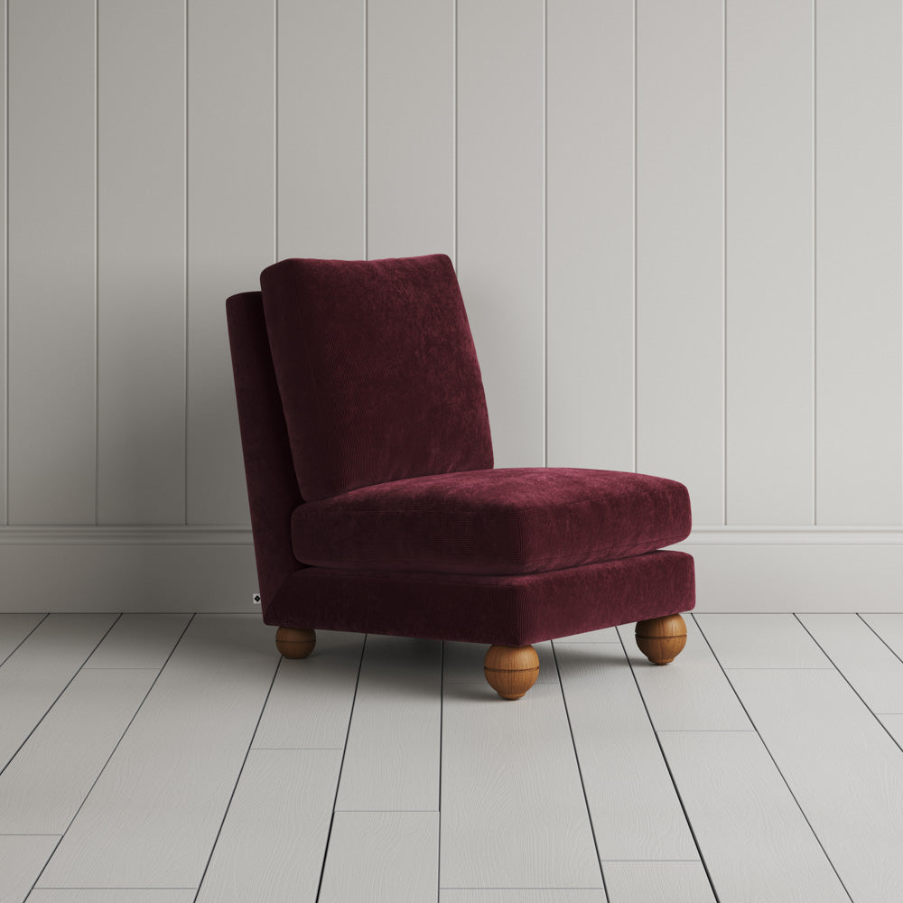 Perch Armchair slipper chair in classic corduroy cherry, angled view by NiX.