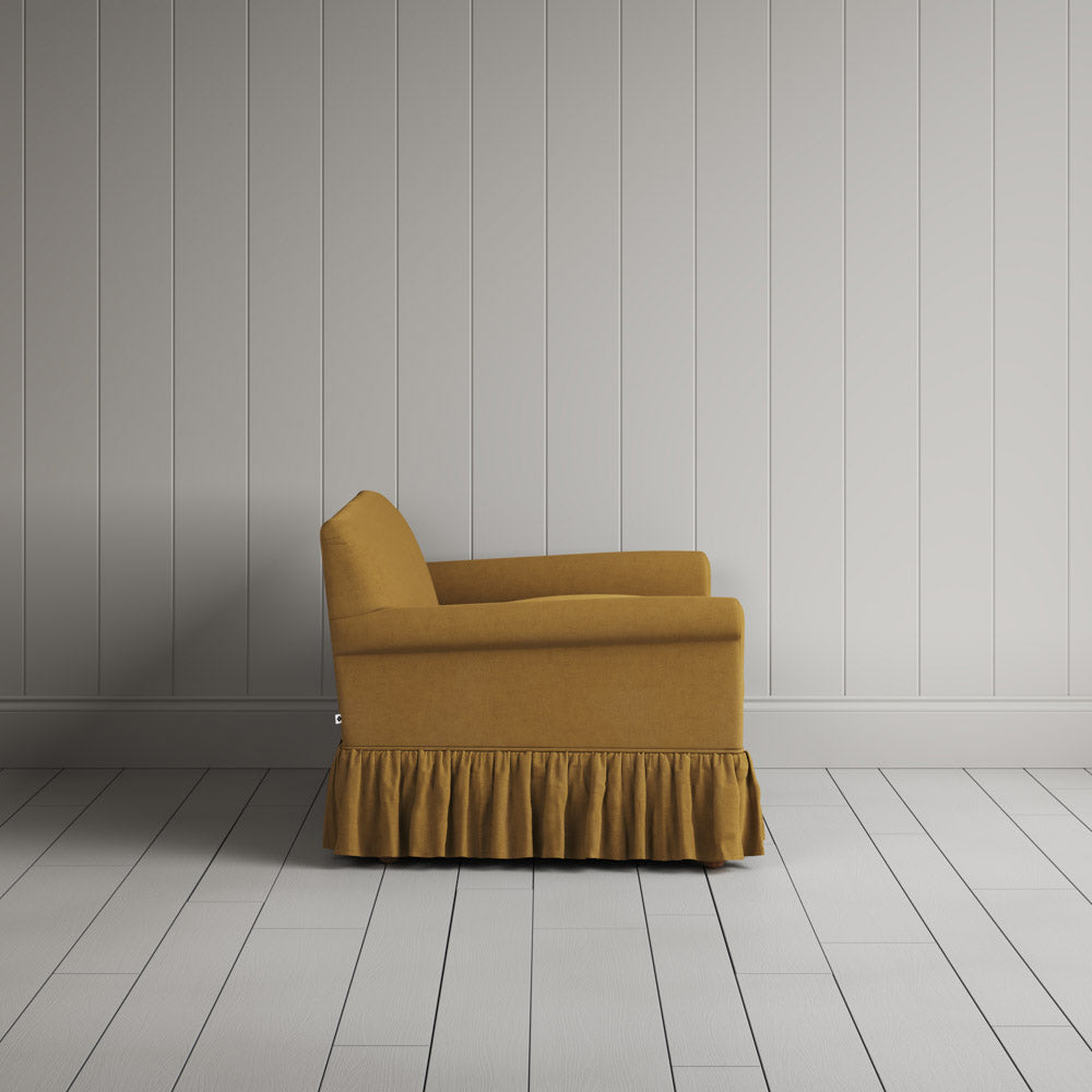 Side view showing the relaxed frame of the Curtain Call NiX interiors sofa.