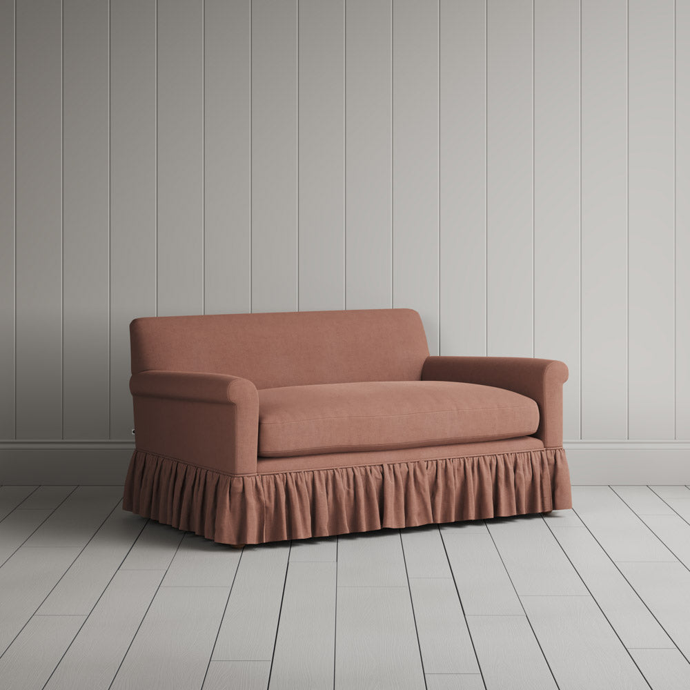 Three-quarter view of the Laidback Linen Roseberry Curtain Call love seat by NiX.