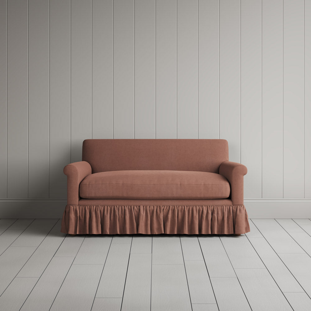 Front portrait of the Laidback Linen Curtain Call love seat by Nicola Harding interiors.