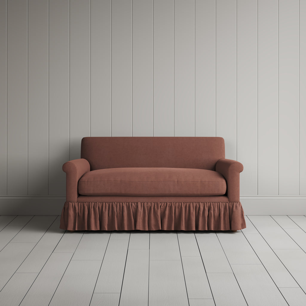 Front portrait of the Laidback Linen Curtain Call love seat by Nicola Harding interiors.