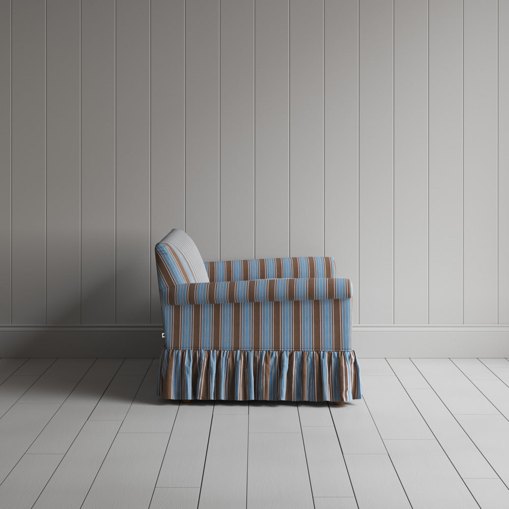 Compact side profile of a luxury blue cotton love seat by Nicola Harding.