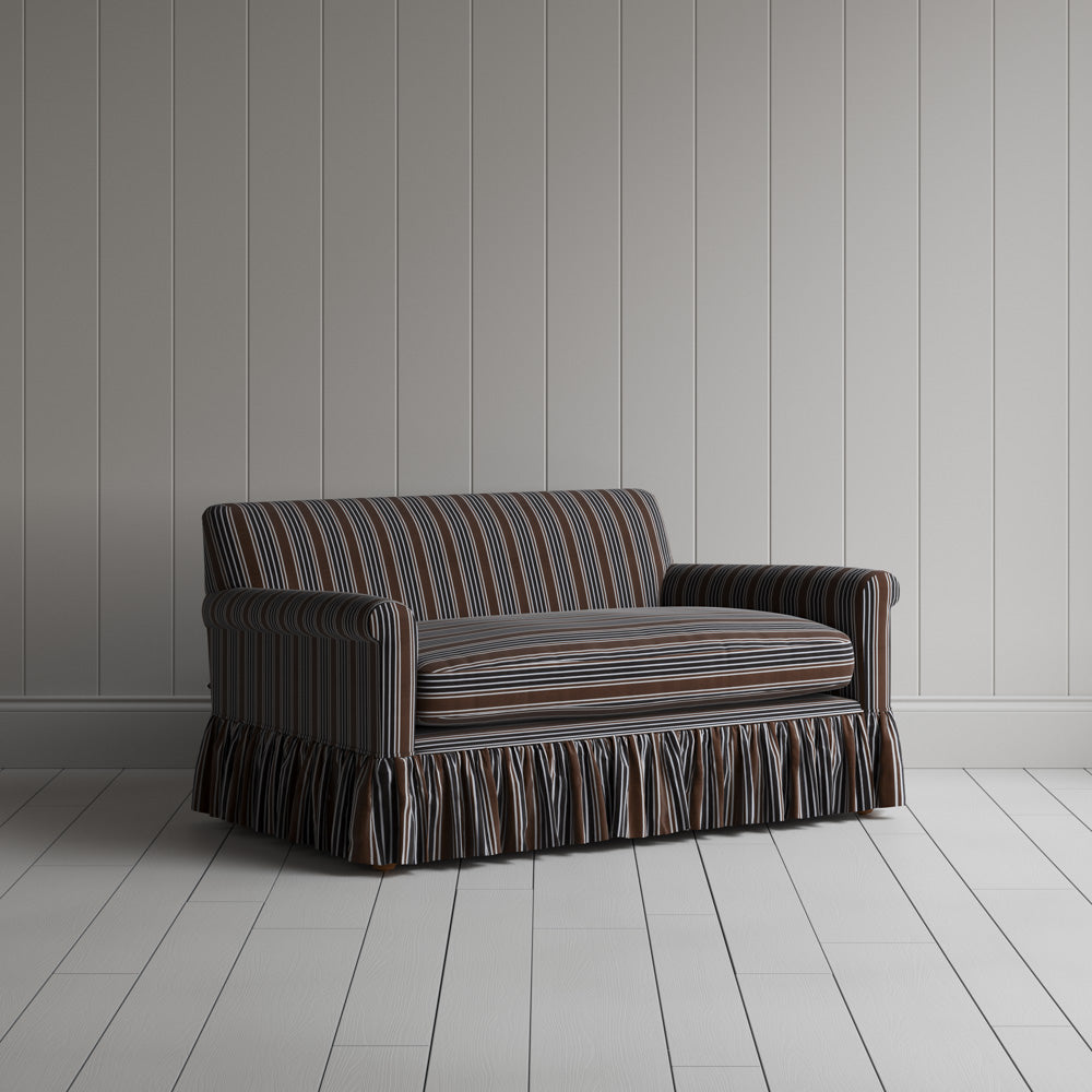 Three-quarter view of the Regatta Cotton Charcoal Curtain Call love seat by NiX.