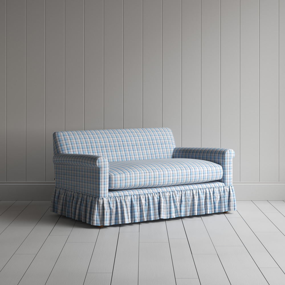 Three-quarter view of the Square Deal Cotton Blue Brown Curtain Call love seat by NiX.