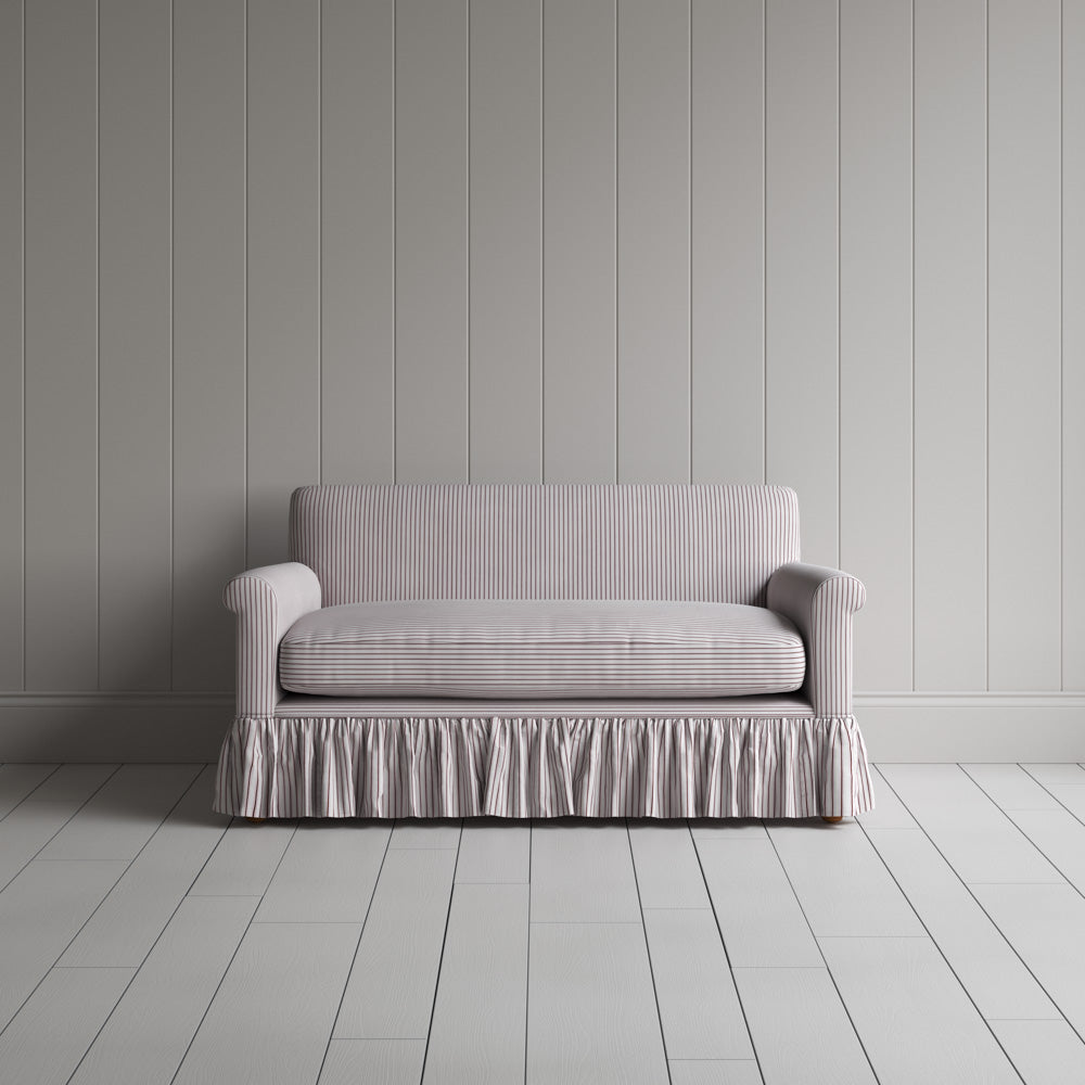 Front view of the Ticking Cotton Curtain Call love seat by Nicola Harding interiors.