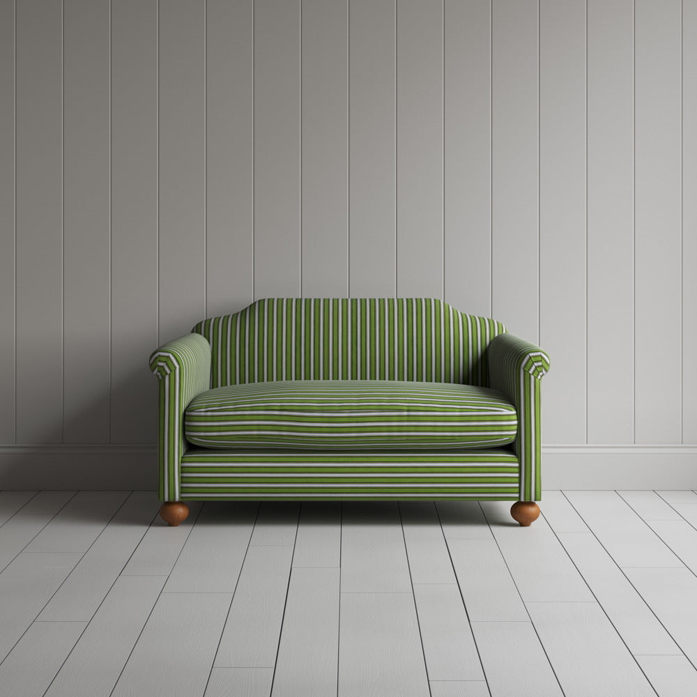 Front view of the Colonnade Cotton Green and Wine Dolittle love seat by Nicola Harding interiors.