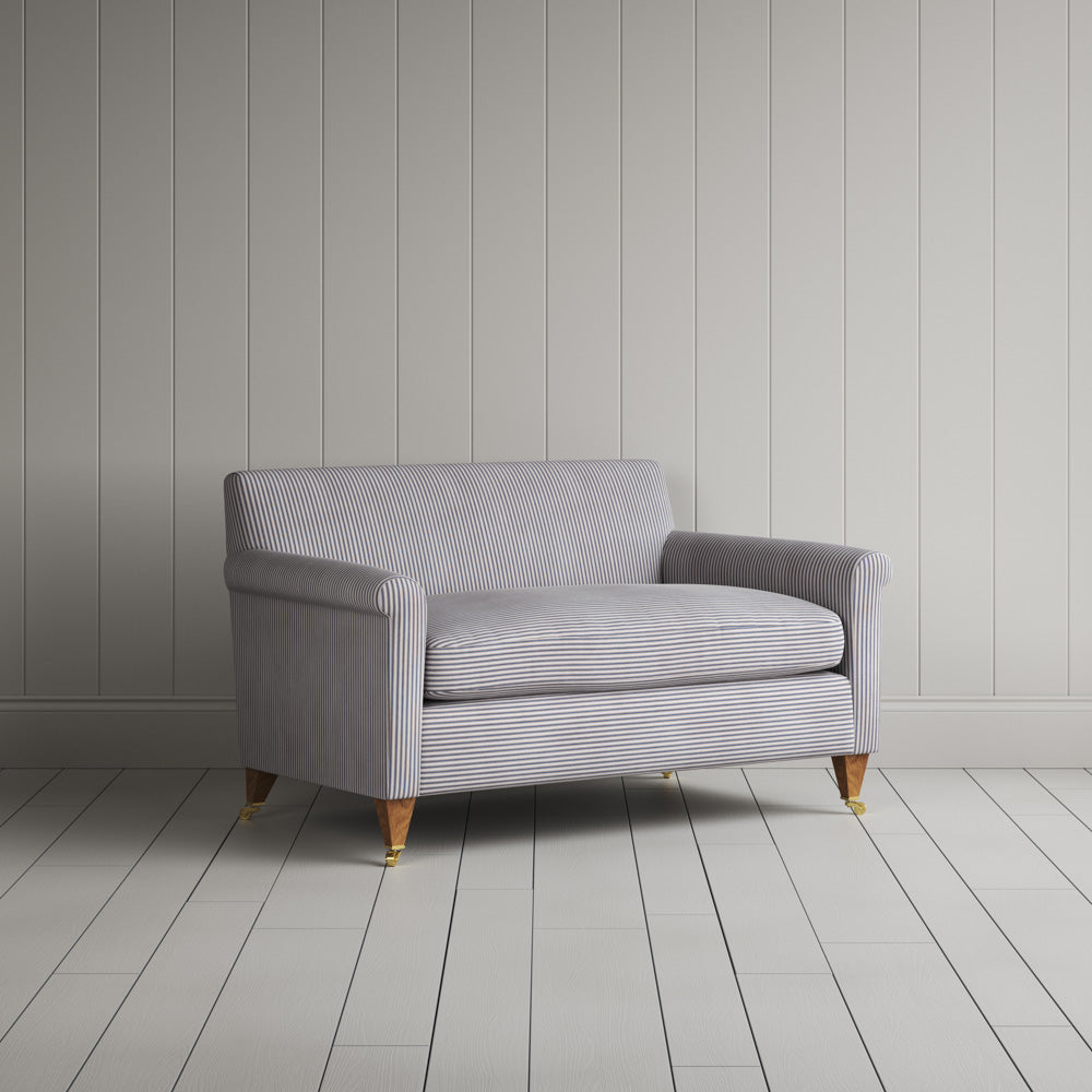 Angled perspective of the Idler BIG LOVE seat in ticking cotton showing its generous proportions and comfortable design by Nix.