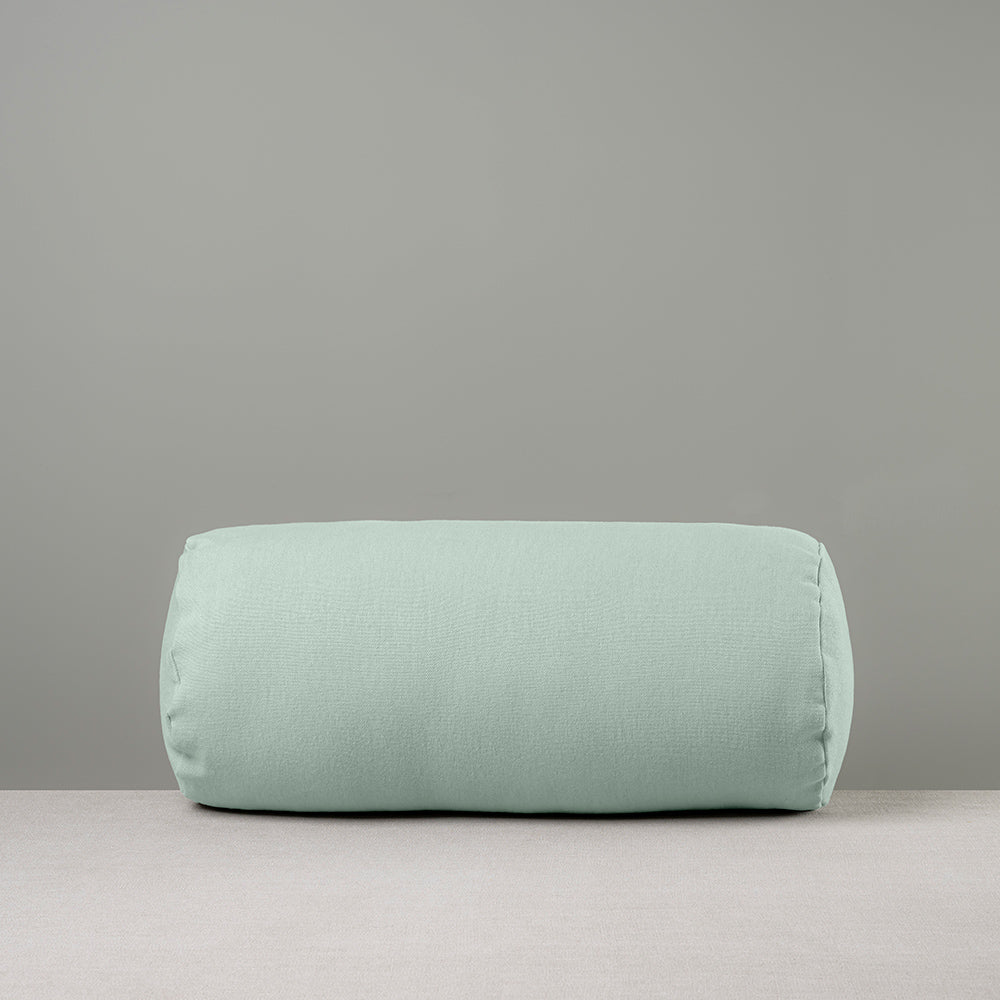 Front Side of Bask Bolster Cushion in Laidback Linen, Sky - Nicola Harding