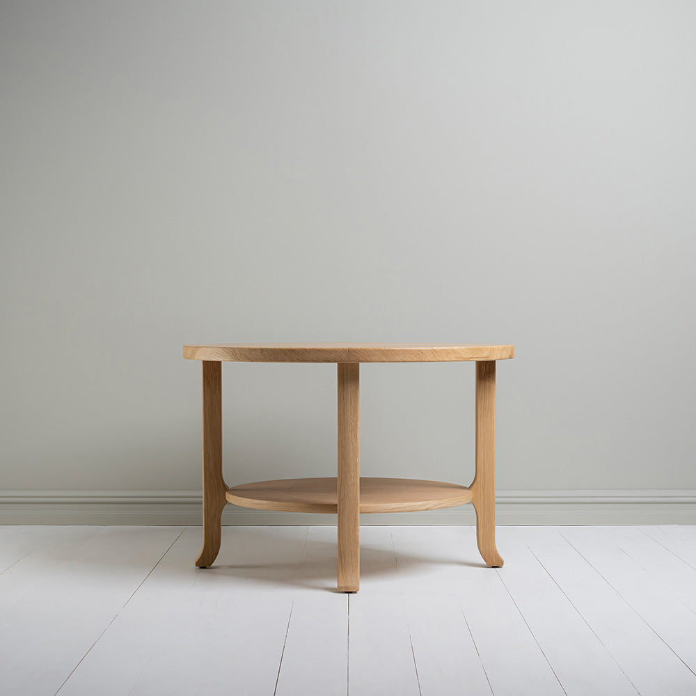 Side View of Round Perk Coffee Table, Oiled Oak - NiX By Nicola Harding & Co.