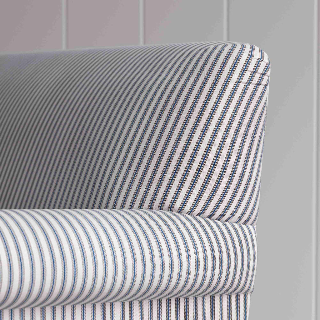 Clean rear view showing the straight back silhouette of the Curtain Call sofa by NiX.