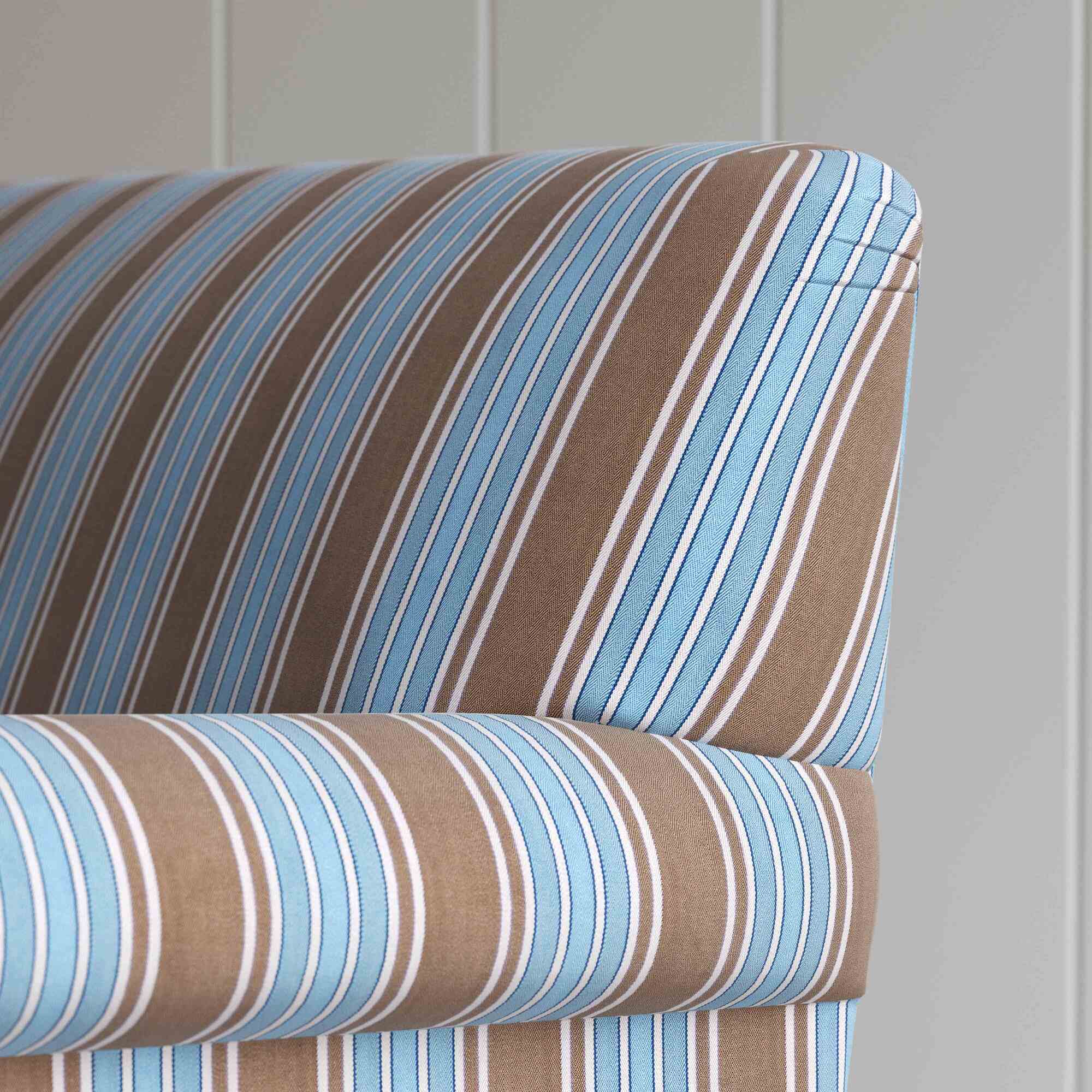 Back profile of a premium blue cotton curtain call love seat by Nicola Harding.