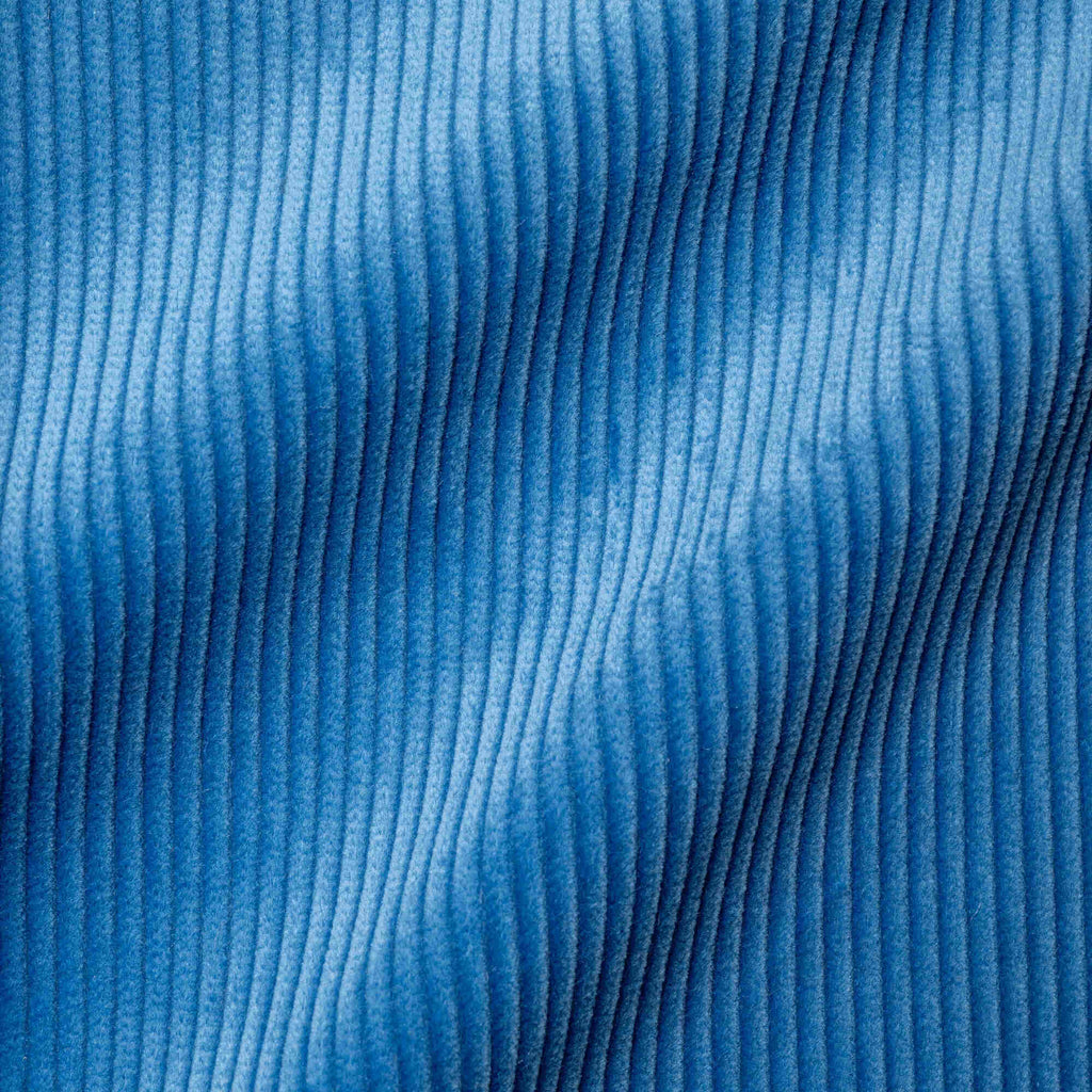 Flat lay of Harbour Blue Classic Corduroy, a rich navy ribbed fabric for luxury seating.