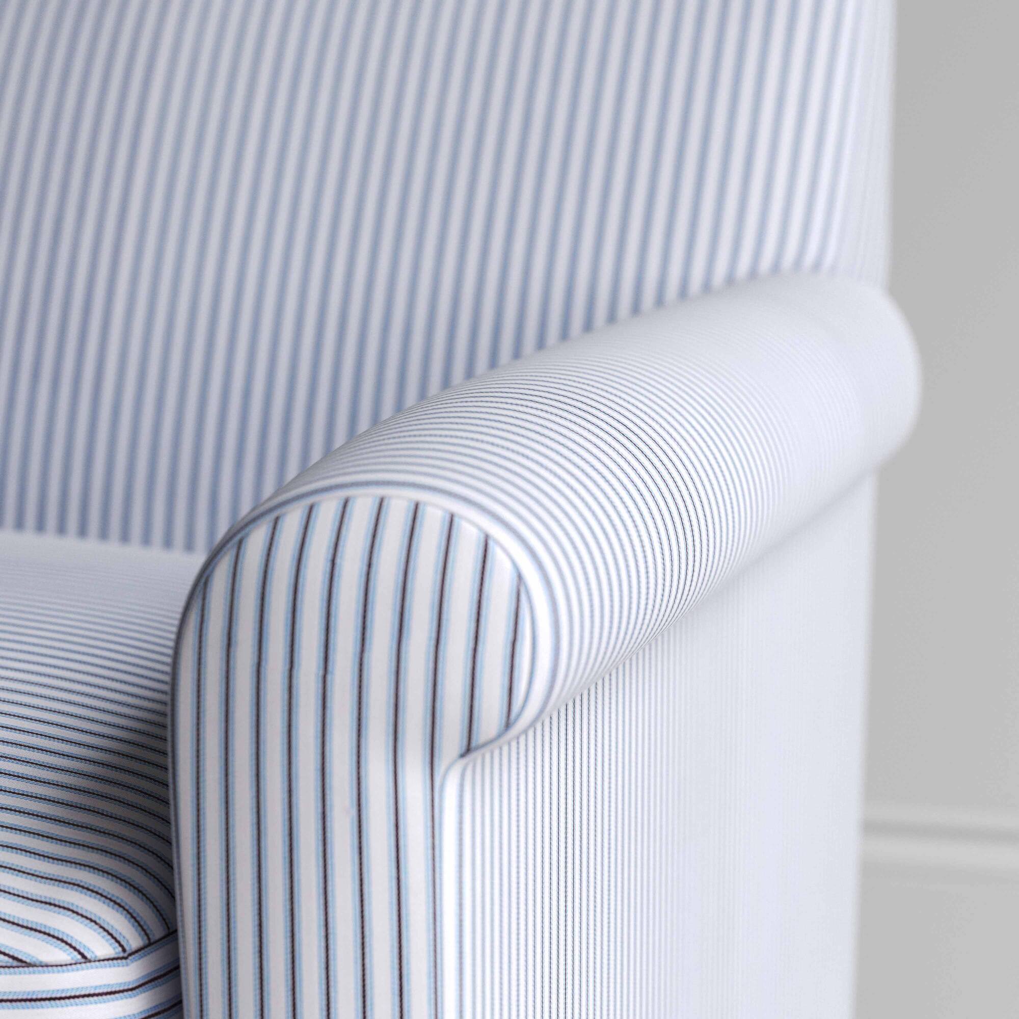 Detailed view of ticking stripe upholstery on the armrest by Nicola Harding.