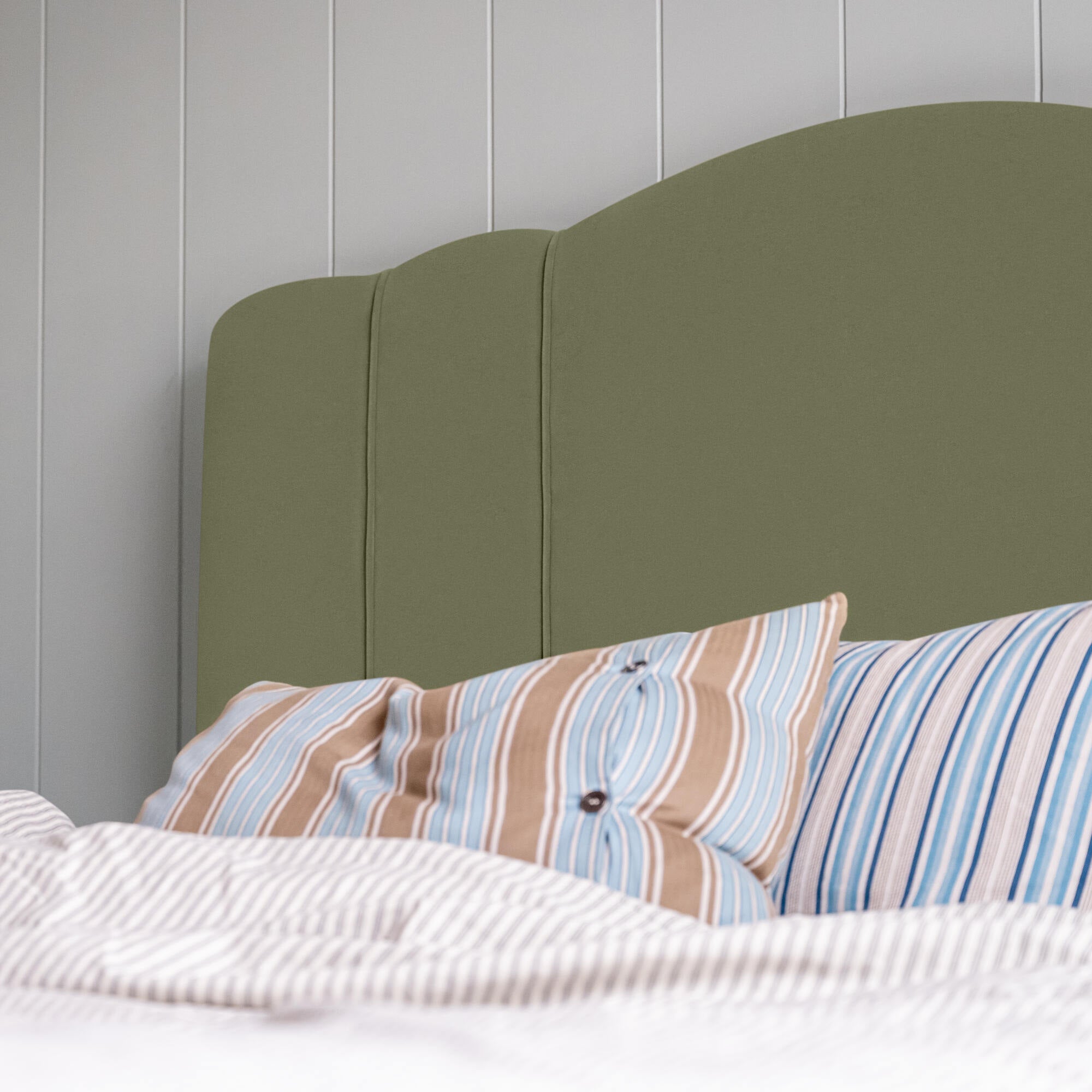 Cloud Nine Upholstered king size Bed in Intelligent Velvet Green Tea, designs and stitching closeup.