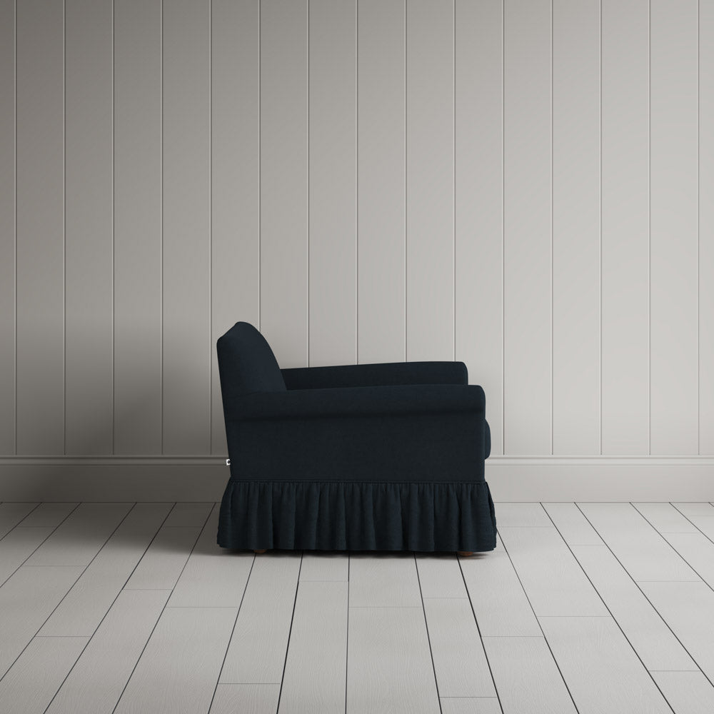 Curtain Call Love Seat in laidback linen midnight, side profile view showing silhouette