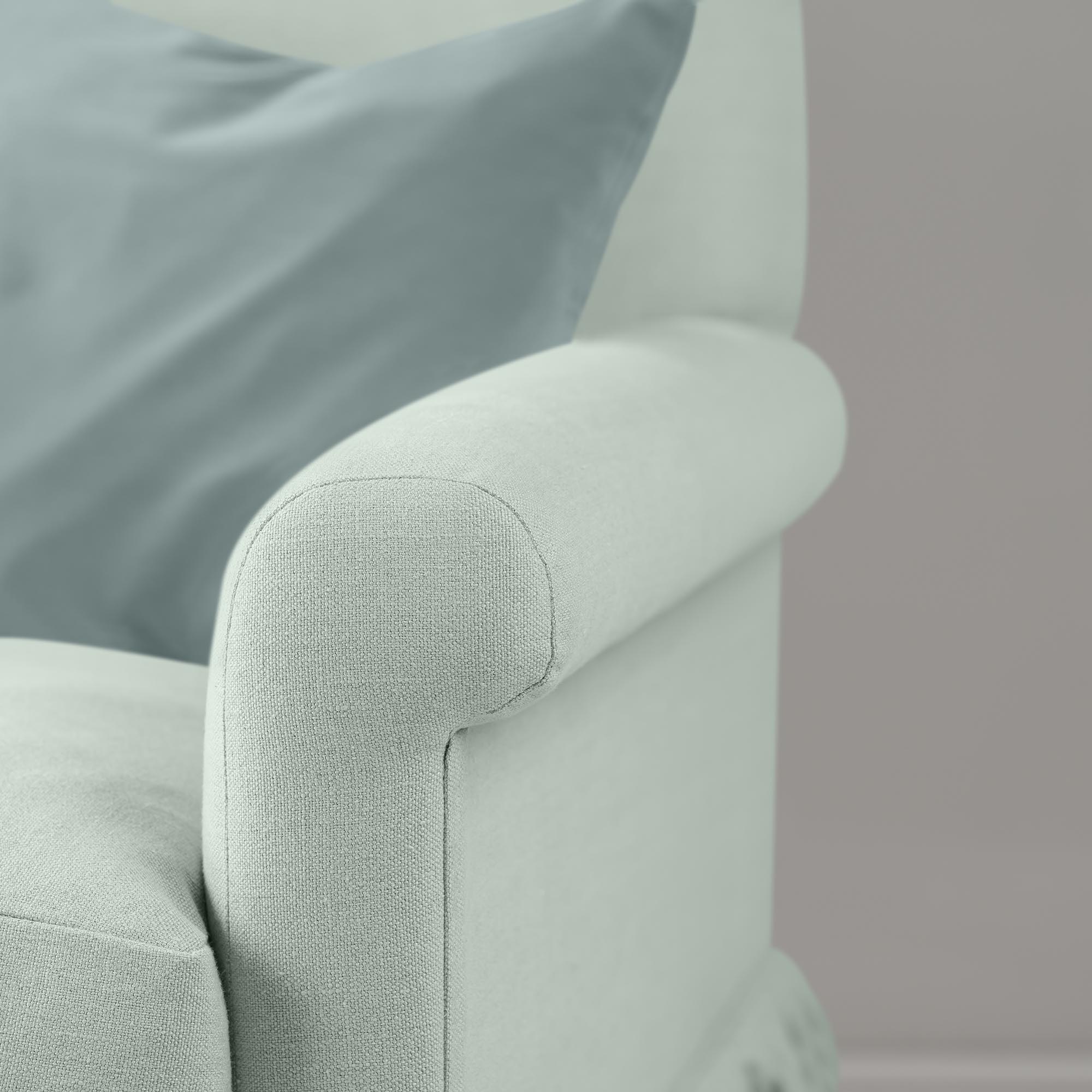 Arm detail closeup styled with NiX cushion, Laidback linen in Sky