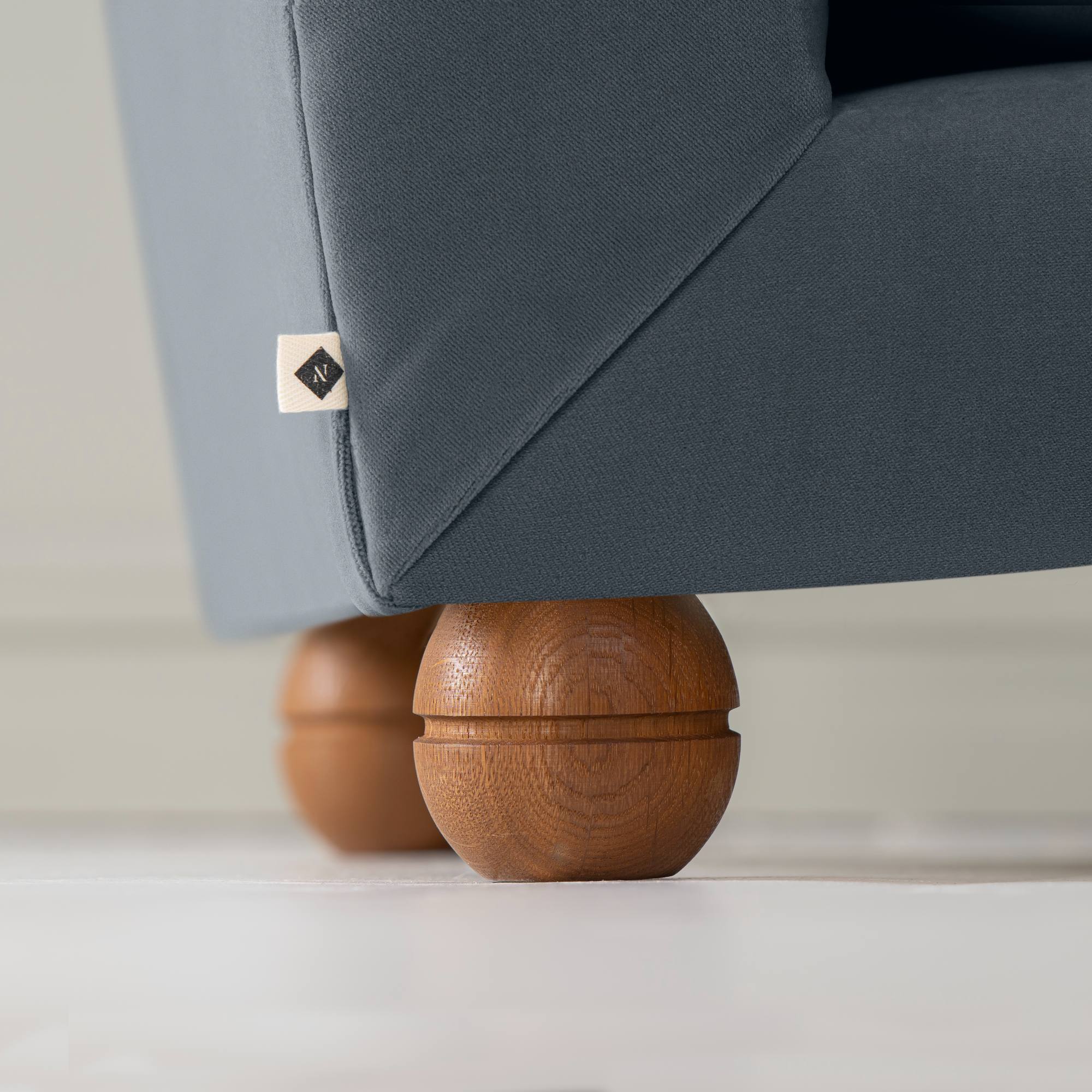 Perch Slipper Armchair in Well Plaid Frame and Intelligent Velvet Mineral Seat, With Cushion, an Ottoman, and a Brass Base Floor Lamp With, To The Point Paper Empire Lamp Shade in Soft White with Peacock Blue Trim - Nicola Harding