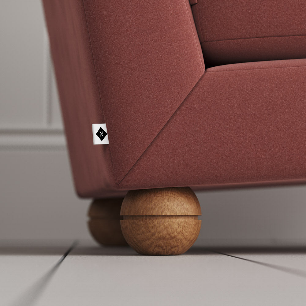 Upholstered sofa with wooden feet