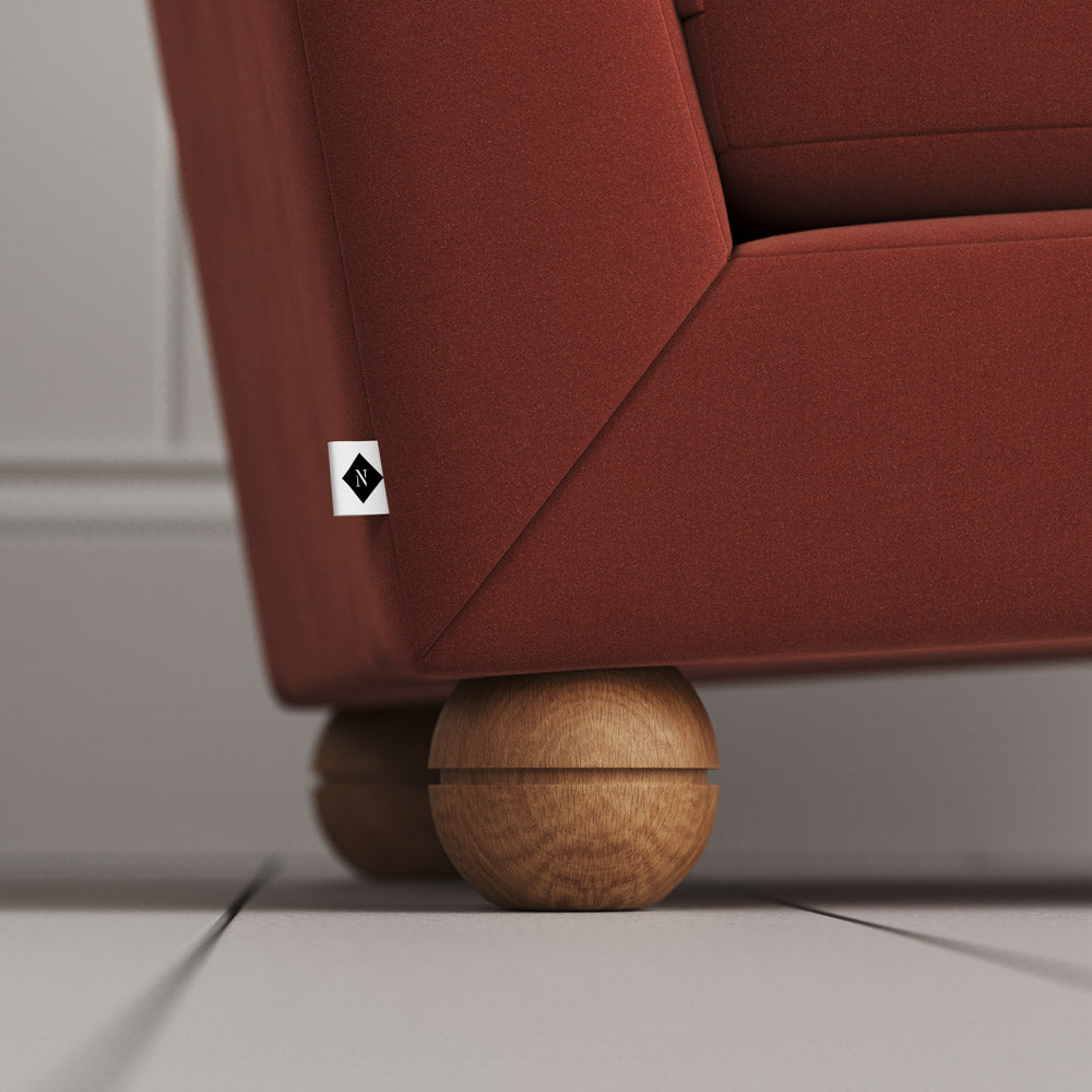Upholstered sofa with solid wood feet