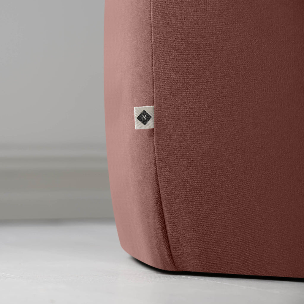 Thither Hexagonal Ottoman in Intelligent Velvet Damson, With NiX Special tag Closeup