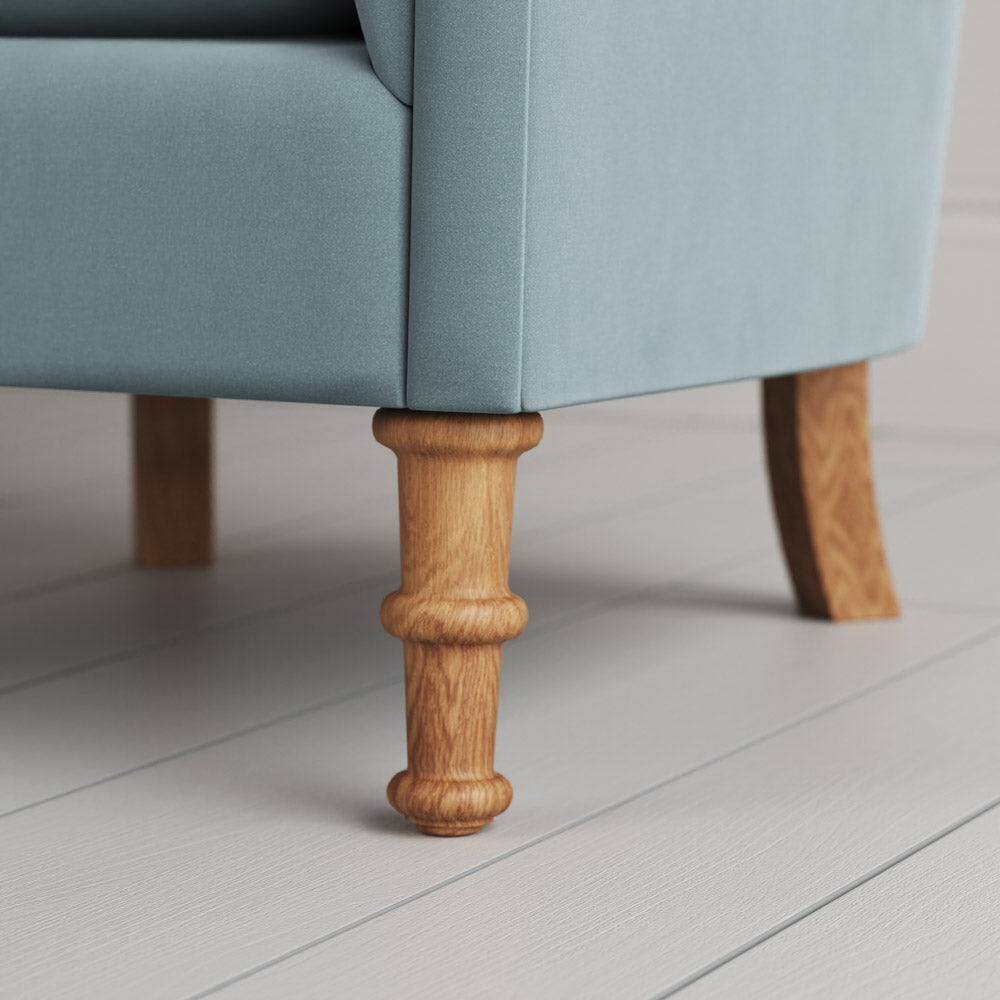 Time Out Armchair close-up detail of the turned timber front legs by NiX.