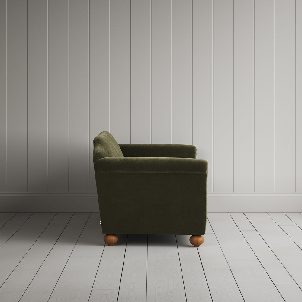  Side profile of the Caper green corduroy Dolittle sofa 