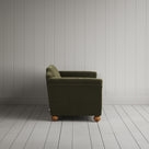 Side profile of the Caper green corduroy Dolittle sofa