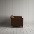 Side profile of the Tobacco corduroy Dolittle sofa, 