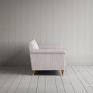 Side profile of the striped Idler sofa by NiX