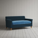Angled view of the Velvet Aegean Idler sofa by NiX