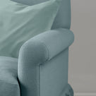 Curtain Call cerulean linen love seat styled with cushion, Nicola Harding & Co