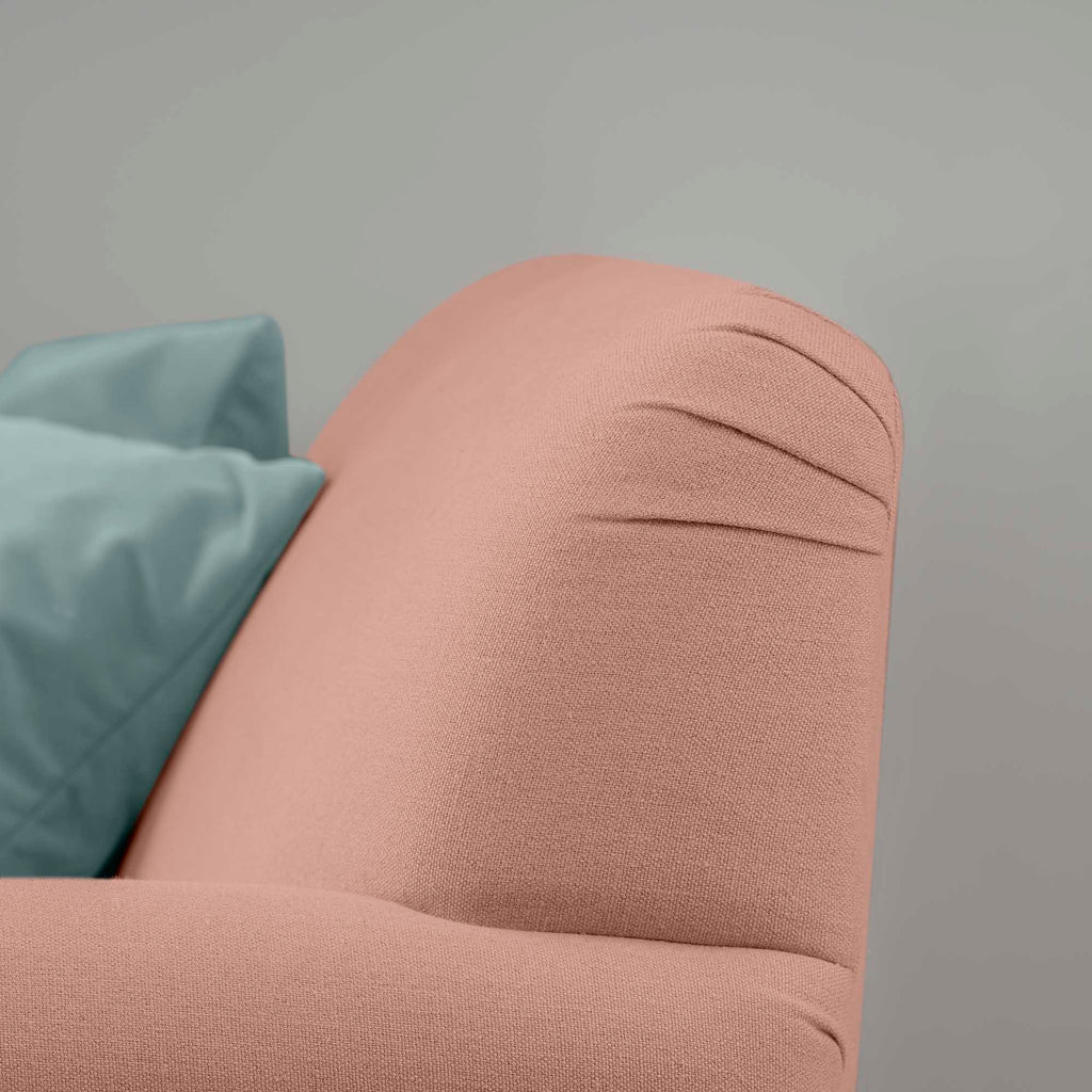  Curtain Call Love Seat close-up detail of the rounded backrest corner in laidback linen roseberry. 