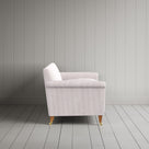 Side profile of the striped Idler sofa by Nicola Harding