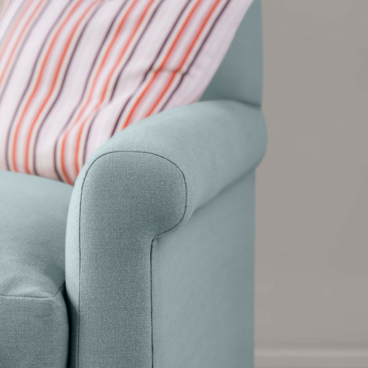 Close-up of the tailored armrest on the Cerulean Idler by Nix.