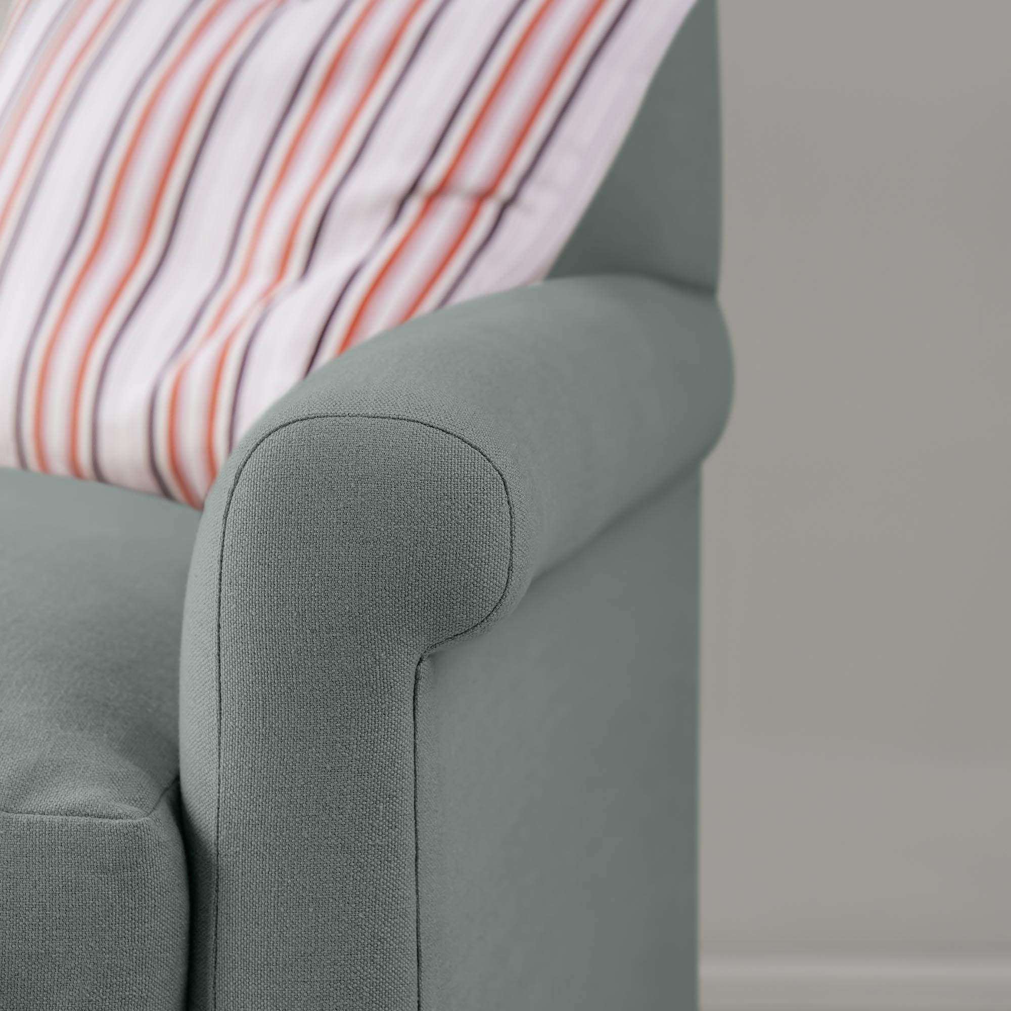  Closeup view of Mineral linen upholstery on the armrest by Nicola Harding. 